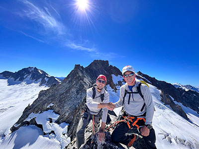 Joel and Fred smile on a climb of Sharkfin Tower